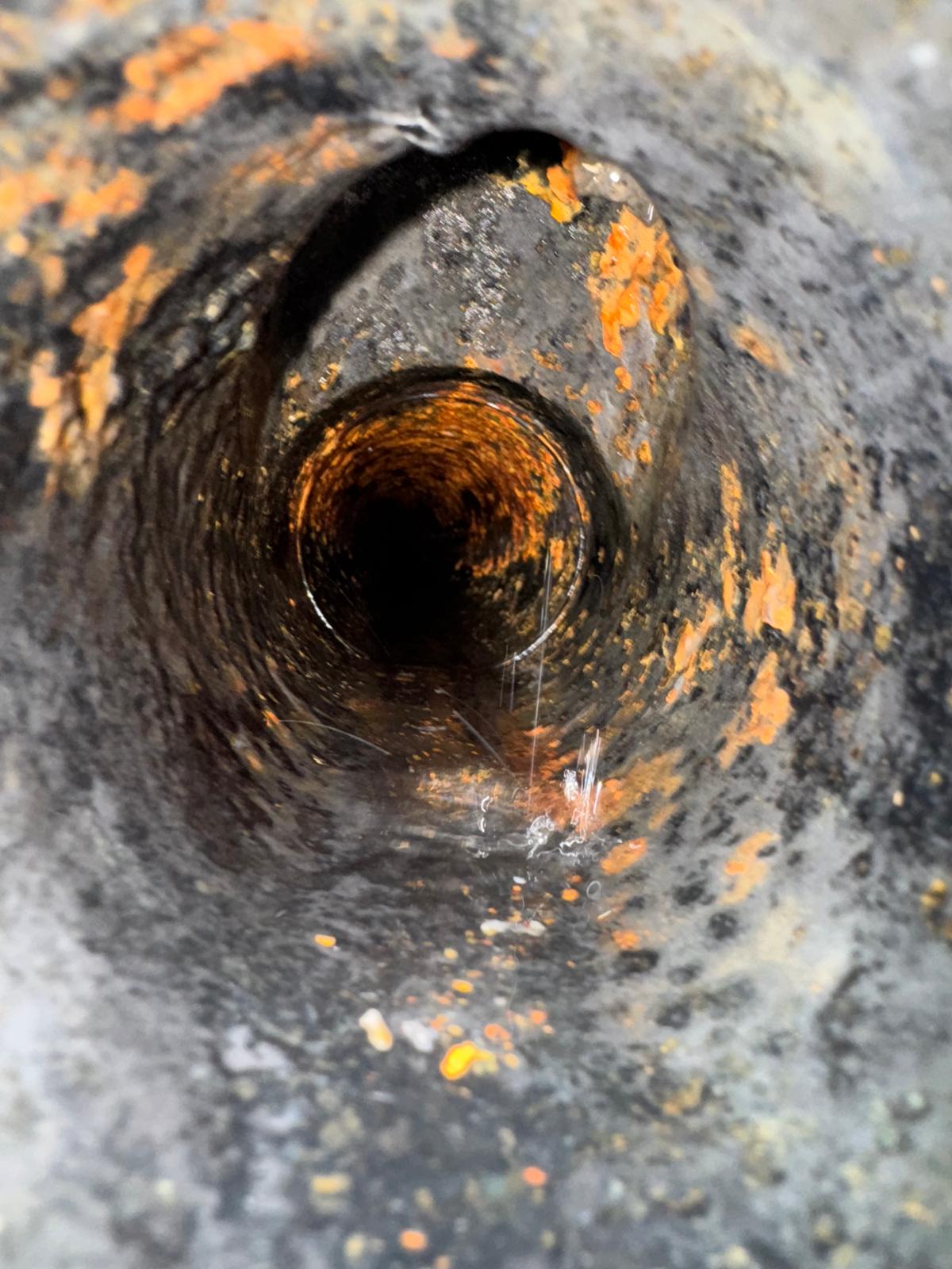 Inside view of drain pipe after hydro jetting with clear flow, commercial plumbing in Richmond