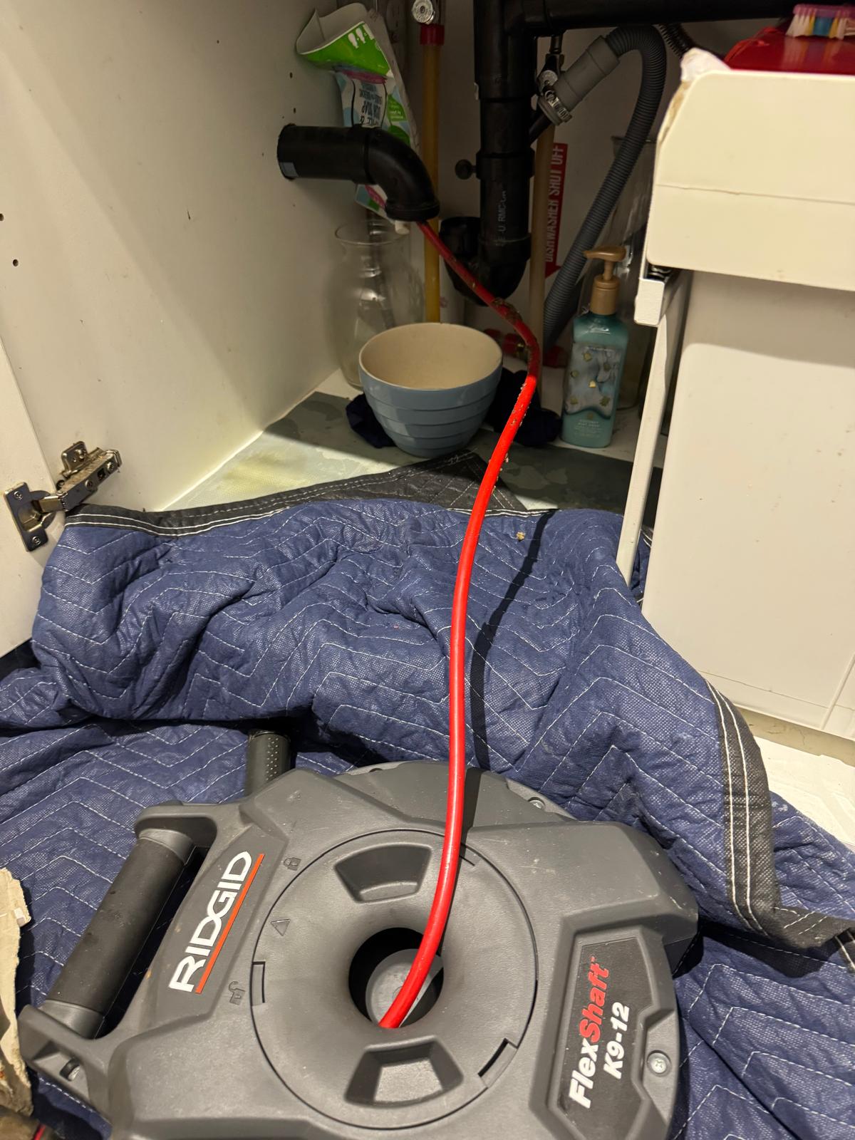 Flex shaft descaling tool used to clear clogged kitchen sink — drain cleaning in Vancouver