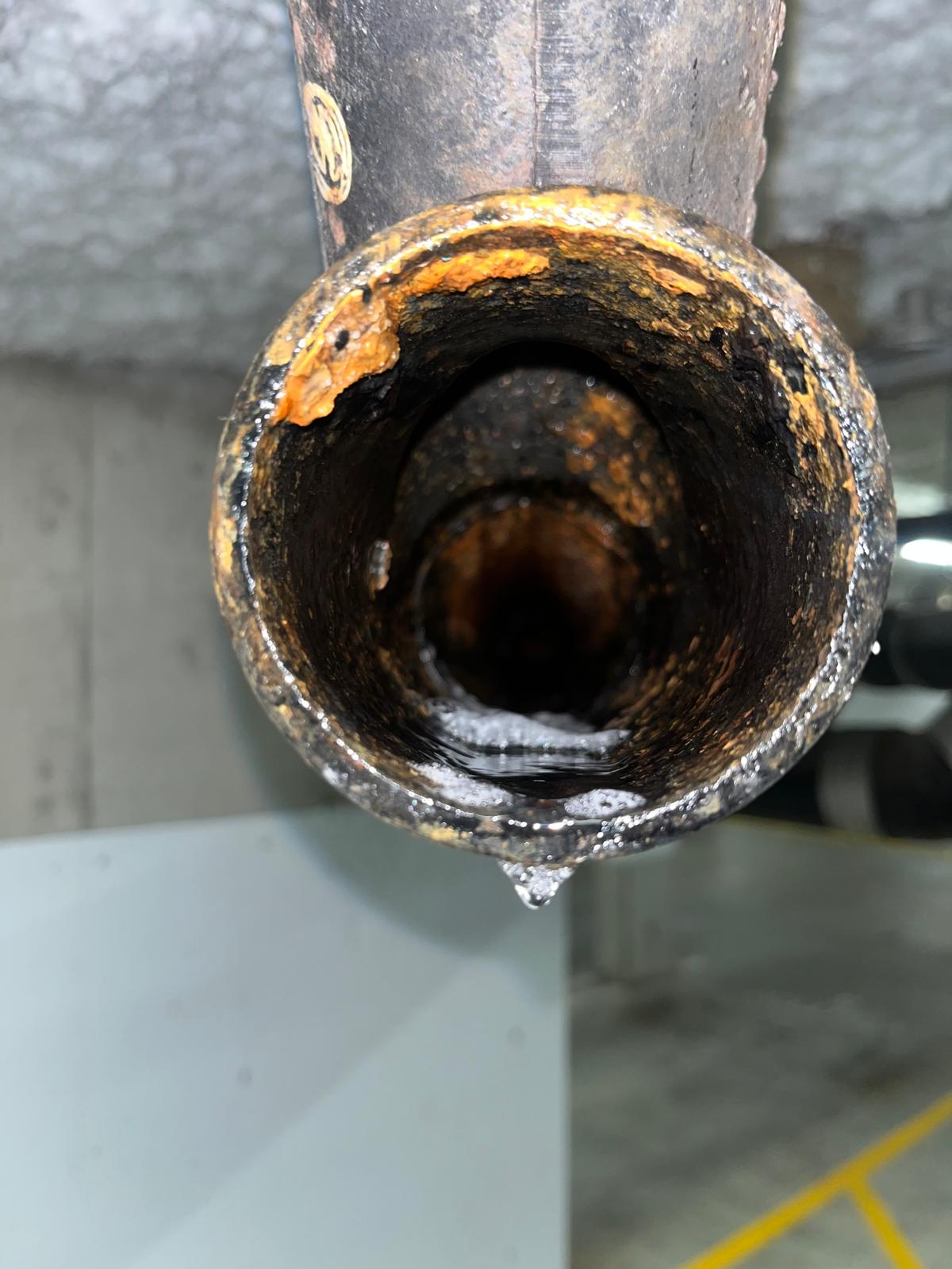 Parkade drainage line after major drain cleaning project — commercial plumbing in Richmond